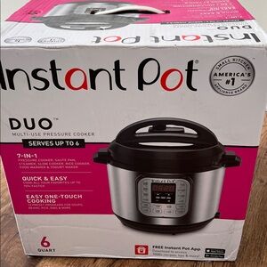 Instant Pot Duo 7-in-1 Electric Pressure Cooker, Black and Silver